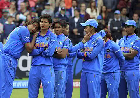 India players stand dejected prior to receiving their runners-up medals after losing the ICC Women's World Cup final match against England at Lord's in London Sunday July 23 2017. | AP