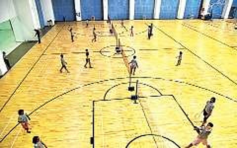 Children receiving badminton coaching at the KSFL - Tenvic Sports Coaching Academy