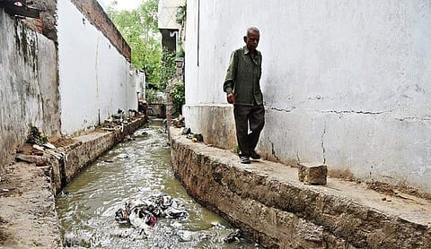 Sewage from houses flowing through an open drain at Mohan Nagar in Musheerabad | r satish babu