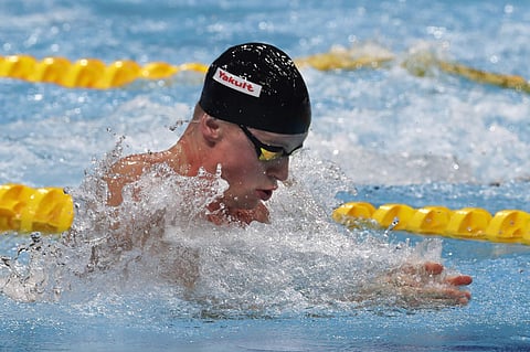 Adam Peaty swims when setting a new world record in a men's 50-meter breaststroke heat during the swimming competitions of the World Aquatics Championships. (AP)