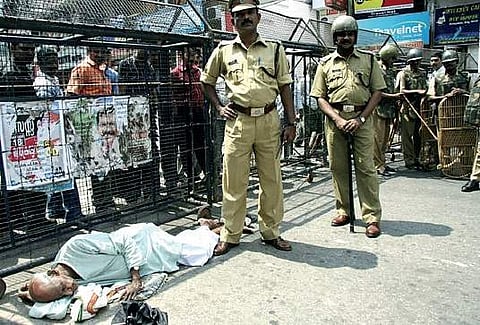 1. K E Mammen protests against the denial of freedom of movement in front of the Secretariat when the police blocked the MG Road for demonstration by Youth Congress workers