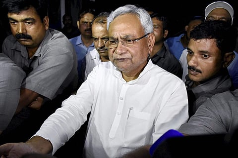 Bihar Chief Minister Nitish Kumar speaks to the media after meeting Governor KN Tripathi in Patna on Wednesday. | PTI