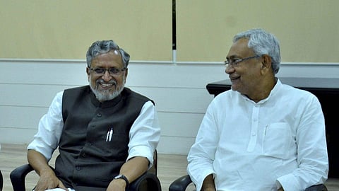 Bihar Chief Minister Nitish Kumar with senior leader of BJP Sushil Kumar Modi.