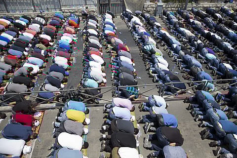 Palestinians pray outside Jerusalem's Old City, Friday, July 28, 2017. (Photo| AP)