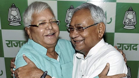 Bihar Chief Minister and Janata Dal(United) supremo Nitish Kumar (R) with Rashtriya Janata Dal chief Lalu Prasad Yadav.