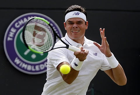 Canada's Milos Raonic returns to Germany's Jan-Lennard Struff during their Men's Singles Match. | AP
