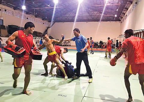 Rajvir Singh (centre) with participants at the national camp in Shilaroo, Himachal