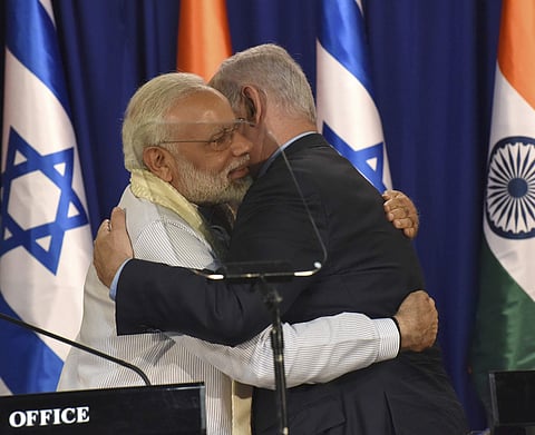 Indian Prime Minister Narendra Modi, left, and Israeli Prime Minister Benjamin Netanyahu embrace at the end of a joint press conference at Netanyahu's residence in Jerusalem, Israel. (AP)