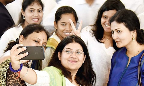 Students pose for a group selfie during the Indian Institue of Science convocation on Wednesday | NAGARAJA GADEKAL
