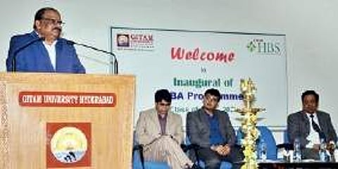G Vaasudevan, vice-president, Kotak Mahindra Bank, delivering a speech during the inauguration of BBA programme at GITAM HBS in Hyderabad on Wednesday | express