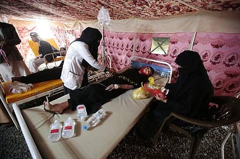 In this photo taken on Thursday, Jun 29, 2017, an elderly woman is treated for suspected cholera infection in a tent at a hospital in Sanaa, Yemen, Saturday, Jul. 1, 2017. (AP)