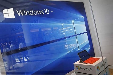 A display for the Windows 10 operating system is seen in a store window of the Microsoft store at Roosevelt Field in Garden City, New York, U.S., July 29, 2015. (Photo | REUTERS)