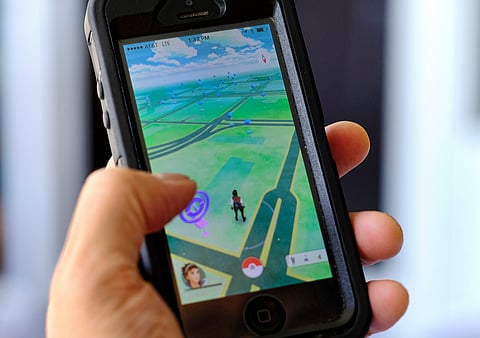 Pokemon Go is displayed on a cell phone in Los Angeles. (File Photo | AP)