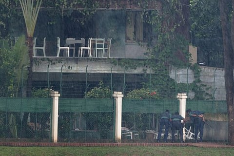 The back garden of an upscale cafe in Dhaka, a day after a bloody siege ended in July 2016. (File Photo | AFP)