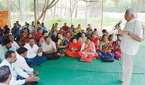 TJAC chairman Prof Kodandaram addressing the assistant contract professors of Osmania University in Hyderabad on Friday | Sathya Keerthi