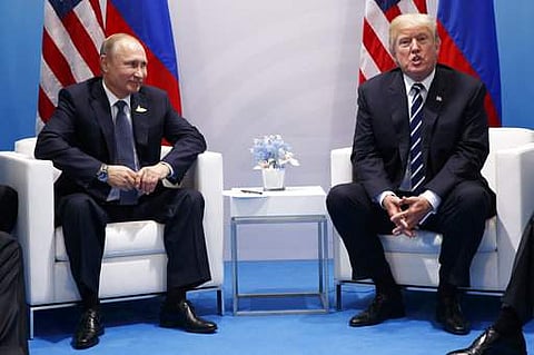 President Donald Trump speaks during a meeting with Russian President Vladimir Putin at the G20 Summit, Friday, July 7, 2017, in Hamburg. | AP