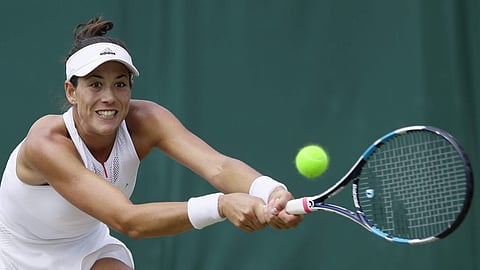 Spain's Garbine Muguruza returns to Romania's Sorana Cirstea during their Women's Singles Match on day six at the Wimbledon. | AP