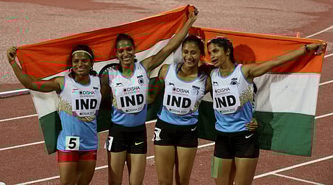 India's women team celebrate after winning the bronze medal in the 4x100m relay women's event during the 22nd Asian Athletic Championships at the Kalina Stadium in Bhubaneshwar on Saturday. | PTI