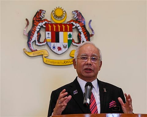 Critics want Najib to explain massive sums allegedly missing from state-owned development company 1MDB, which he launched. | (File/AP)