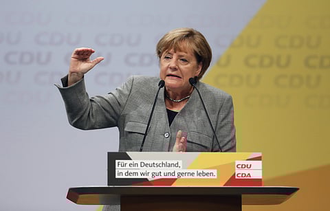 German Chancellor and top candidate of the CDU, for the upcoming general election Angela Merkel delivers a speech during the start of her election campaign. (AP)