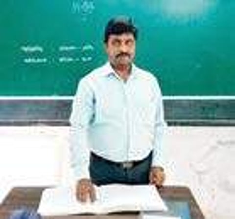 U Sivakumar, the inspiring teacher, in his class at the Ambagarathur Government Higher Secondary School in Karaikal | Express