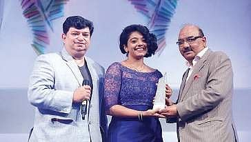 The members of Rainmaker Wedding Planner receiving the award at the Global Indian Wedding Awards