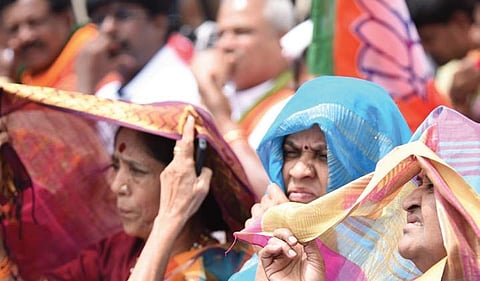 Women at a public rally to welcome BJP national president Amit Shah at the airport in Bengaluru on Saturday | Nagaraja Gadekal