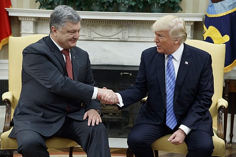 US President Donald Trump shakes hands with Ukrainian President Petro Poroshenko (File |AP)