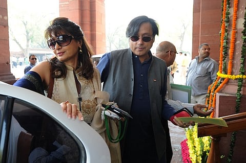 Congress Party's Member of Parliament Shashi Tharoor (R) with his wife late Sunanda Pushkar. |File Photo: AFP
