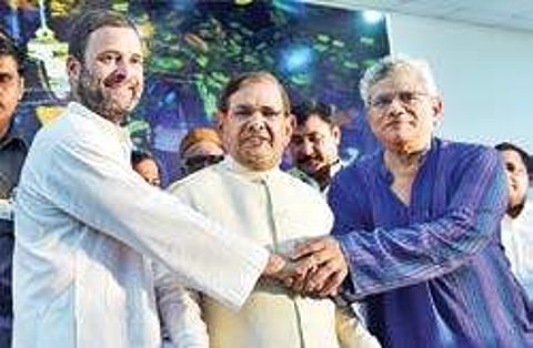 Rahul Gandhi, Sharad Yadav and Sitaram Yechury at the ‘Sanjhi Virasat Bachao’ sammelan in New Delhi on Thursday | pti