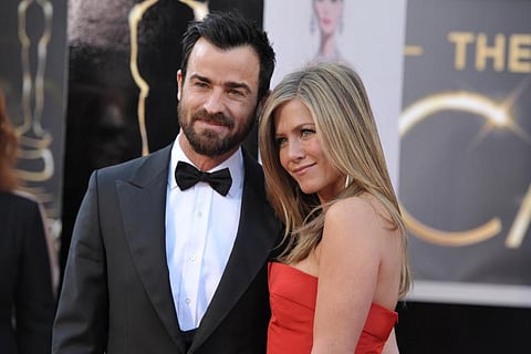 Justin Theroux with Jennifer Aniston. | AP