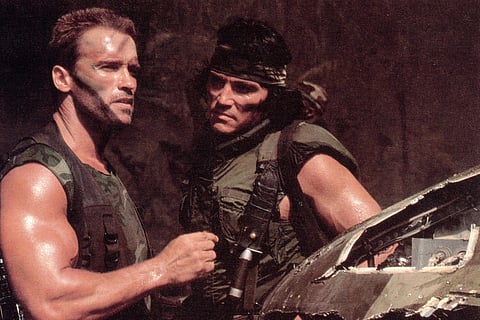Arnold Schwarzenegger and Sonny Landham (right) in 'Predator'. (Photo | 20th Century Fox)