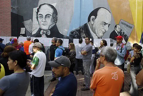 People lineup during the election for a constitutional assembly in Caracas, Venezuela on July 30, 2017. (File photo | AP)