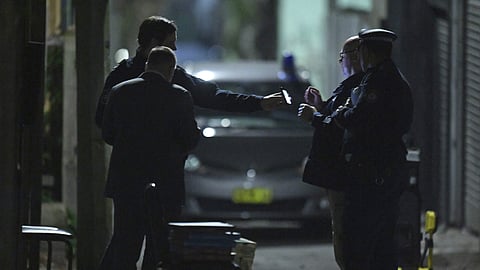 The suspect had been inside a shelter like a shipping container and did take up a police offer to surrender.