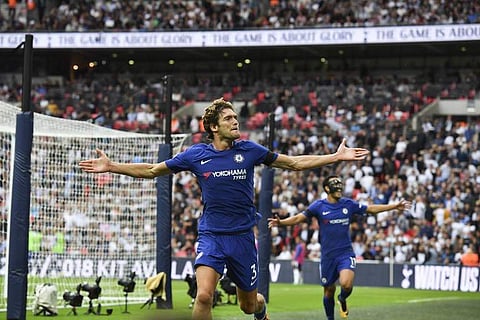 Chelsea's Spanish defender Marcos Alonso (L) celebrates scoring their second goal with Chelsea's Spanish midfielder Pedro (R) | AFP