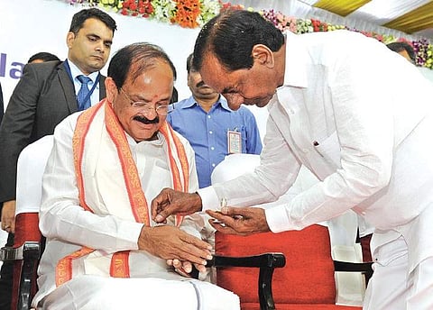 Chief Minister K Chandrasekhar Rao welcomes Vice President M Venkaiah Naidu at the Civic Reception held at Raj Bhavan in Hyderabad on Monday | Express photo