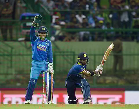Indian wicket-keeper Mahendra Singh Dhoni successfully appeals for the dismissal of Sri Lanka's Kusal Mendis during the second ODI match at Pallekele International Cricket Stadium in Kandy on Thursday. (Photo | PTI)