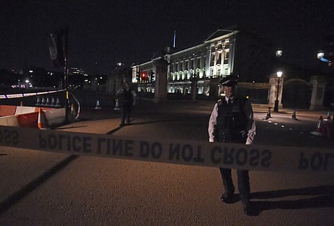 A police cordon outside Buckingham Palace after the incident (AP)