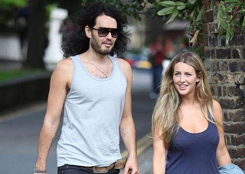 Russell Brand and wife Laura Gallacher. (File | AFP)