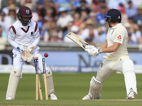 England's Jonny Bairstow is bowled by West Indies Roston Chase after trying a reverse sweep (AP)
