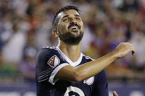 FILE - In this Aug. 2, 2017 file photo, MLS All-Stars' David Villa reacts during the MLS All-Star Game against Real Madrid in Chicago. Three years after his last match with Spain, the veteran striker is the surprise name in the list of players called up b