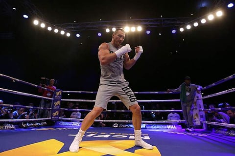 This file photo taken on April 26, 2017 shows Ukraine's Wladimir Klitschko taking part in a work-out. | AFP