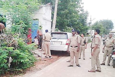 A cordon and search operation being conducted by the police at Patamata in Vijayawada on Wednesday | Express