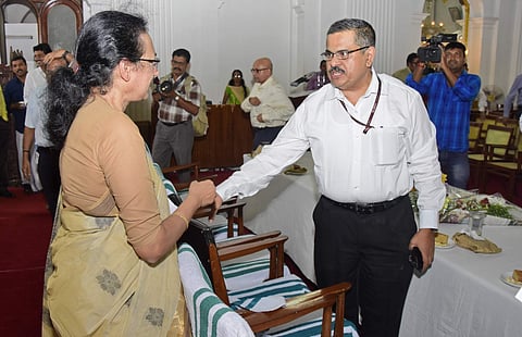 Outgoing chief secretary Nalini Netto having a word with Chief Secretary designate KM Abraham at the farewell accorded to her at the Durbar Hall of the Secretariat on Wednesday. (EPS | B P Deepu)