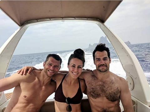 Henry Cavill (right) with his girlfriend Lucy Cork (Photo | Twitter)