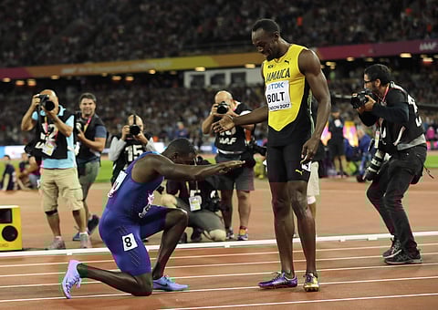 United States' Justin Gatlin bows to Jamaica's Usain Bolt after winning the Men's 100 meters final during the World Athletics Championships in London Saturday, Aug. 5, 2017. (Photo | AP)