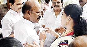 Congress MLA Vijayadharini speaking to AIADMK former ministers Pazahaniyappan and Senthil Balaji at TTV Dinakaran’s residence in Besant Nagar on Saturday | Ashwin Prasath