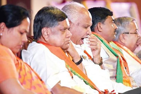 BJP MP Shobha Karandlaje, leader of Opposition in assembly Jagadish Shettar, BJP state president B S Yeddyurappa at the BJP state executive meet held on Sunday I NAGARAJA GADEKAL