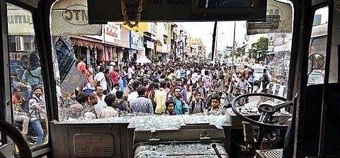 The windshield of an MTC bus that was damaged by students of a school in Thiruvotriyur, demand action against the correspondent for alleged sexual misbehaviour | P Jawahar