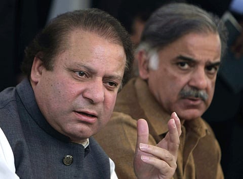 Forer Pakistan Prime Minister Nawaz Sharif (L) with his brother Shahbaz Sharif (File | AP)